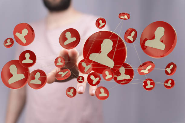 istock Person tapping floating 3D rendered red human icons 1465517895