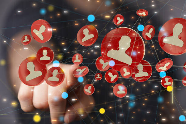 istock Person tapping floating 3D rendered red human icons 1465517944