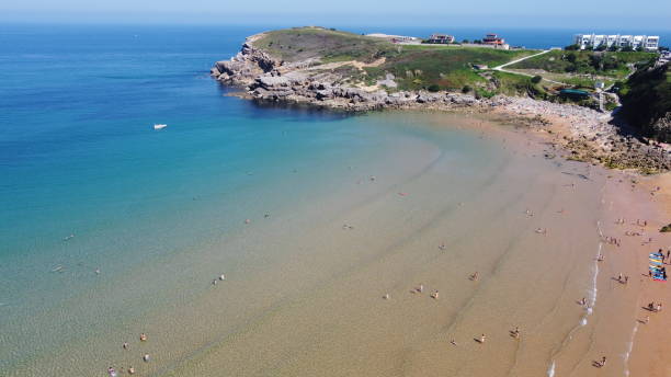 istock Rocky area on the shore on a sunny day 1465518616