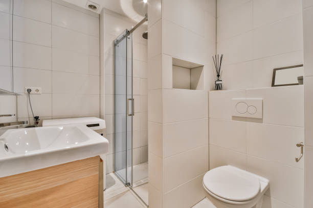 istock Interior of a minimalist style bathroom with light tiles 1465518677