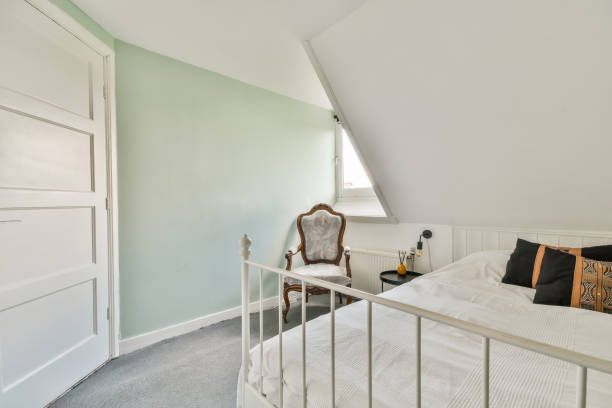 istock Cozy minimalist style bedroom in the mansard 1465518682