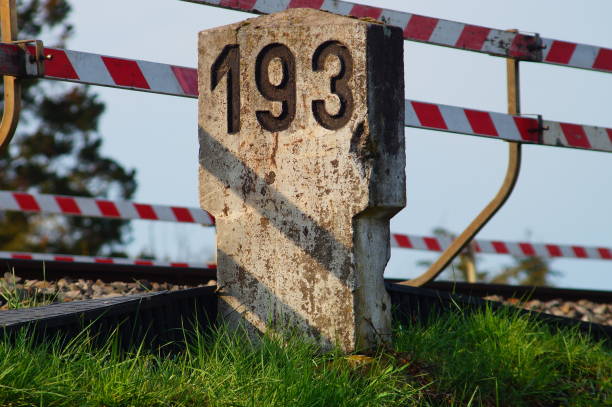 An old milestone, or kilometre stone on the contruction site of the Main-Weser-Bahn in Frankfurt, Germany. It will probably disappear after completion