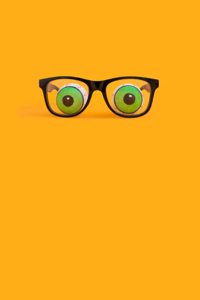 istock Halloween concept with eyeglasses and human doll eyeballs 1465519058