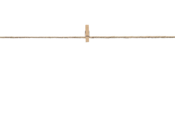 istock Clothespins on Clothesline Isolated 1465519837