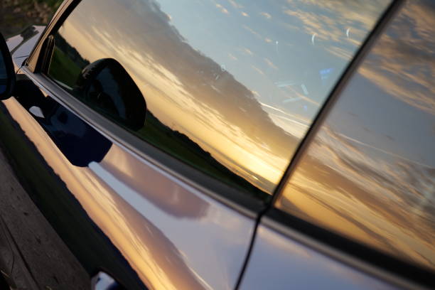 istock Reflection of sunset scene on the car window 1465520299