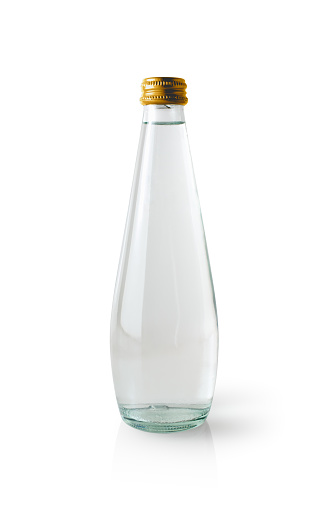 Glass bottle of water isolated on white background.