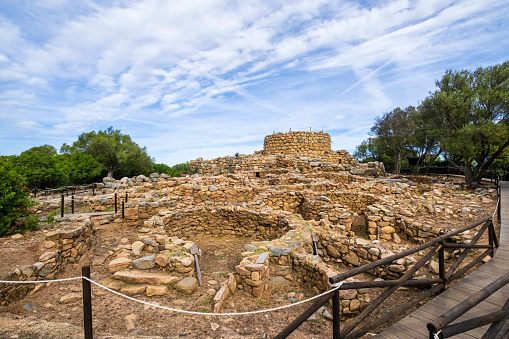 The Nuraghe La Prisgiona is a large Nuragic archaeological site dating back to the 2nd millennium BC, and consisting in a nuraghe and a village of around 90-100 buildings. It is located near Arzachena in Gallura, in the northeast of Sardinia.
