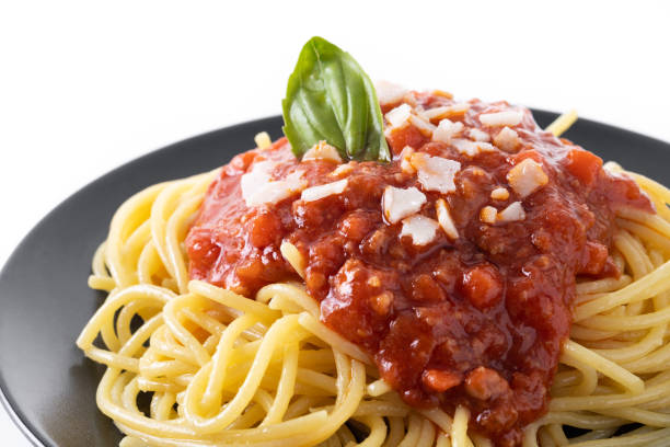 istock Spaghetti with bolognese sauce isolated on white background 1465521547