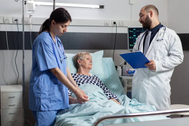 istock Nurse reading blood oxygen saturation from oxymeter 1465522007