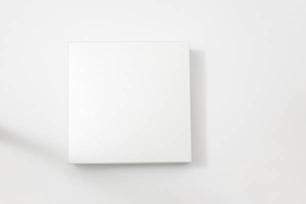 istock White textured box, gift mockup on white background.High resolution photo. Blank White Product Package Box Mock-up. Container, Packaging Template on white. Cardboard box. 1465524021