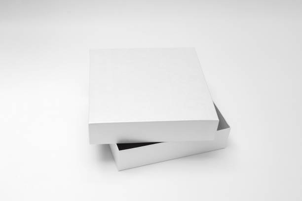 istock White textured opened box, gift mockup on white background.High resolution photo. Blank White Product Package Box Mock-up. Container, Packaging Template on white. Cardboard box. 1465524234