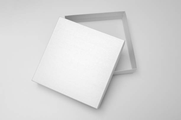 istock White textured opened box, gift mockup on white background.High resolution photo. Blank White Product Package Box Mock-up. Container, Packaging Template on white. Cardboard box. 1465524245