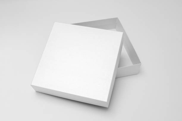 istock White textured opened box, gift mockup on white background.High resolution photo. Blank White Product Package Box Mock-up. Container, Packaging Template on white. Cardboard box. 1465524269