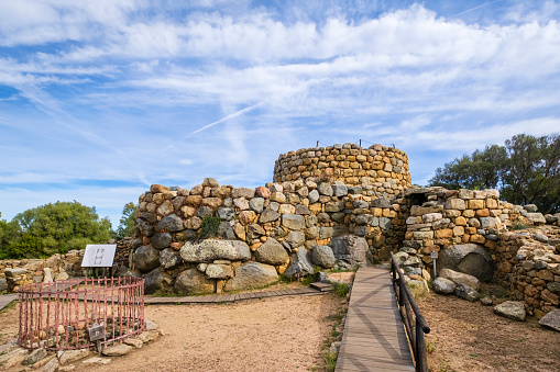 The Nuraghe La Prisgiona is a large Nuragic archaeological site dating back to the 2nd millennium BC, and consisting in a nuraghe and a village of around 90-100 buildings. It is located near Arzachena in Gallura, in the northeast of Sardinia.