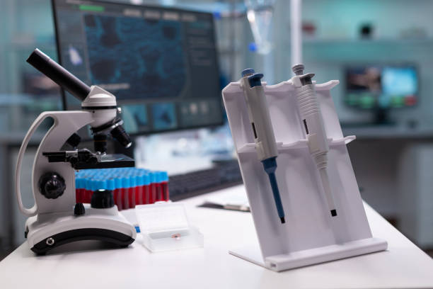 istock Nobody in research laboratory with micro pipette on desk 1465525555
