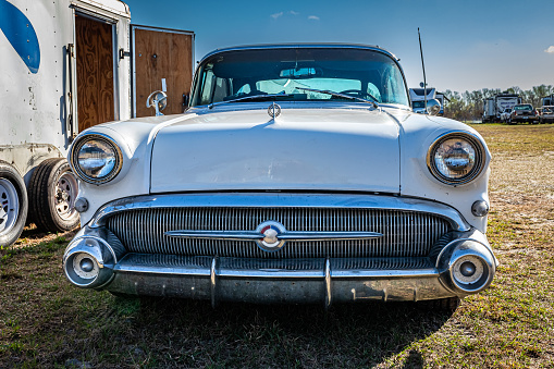 Fort Meade, FL - February 24, 2022: Low perspective front view of a 1957 Buick Century 4 Door Sedan at a local car show.