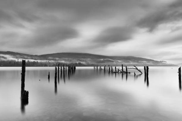 Landscape black and white view of Loch Earn in the highlands of Scotland.