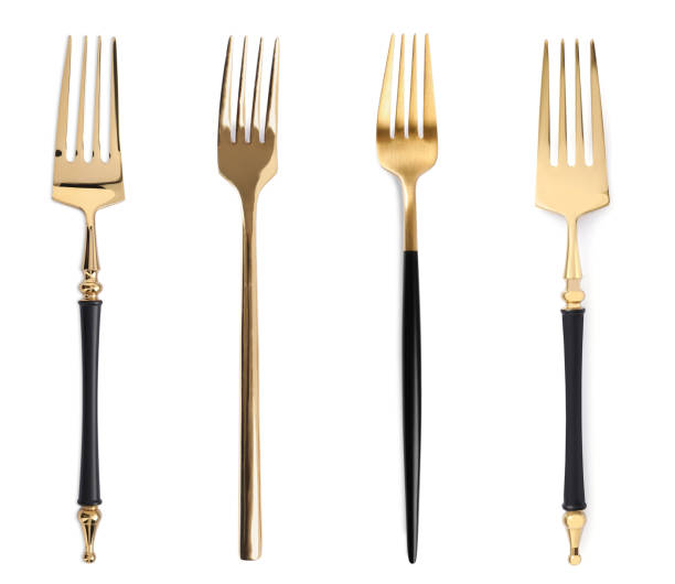 istock Set of shiny golden forks on white background 1465531676