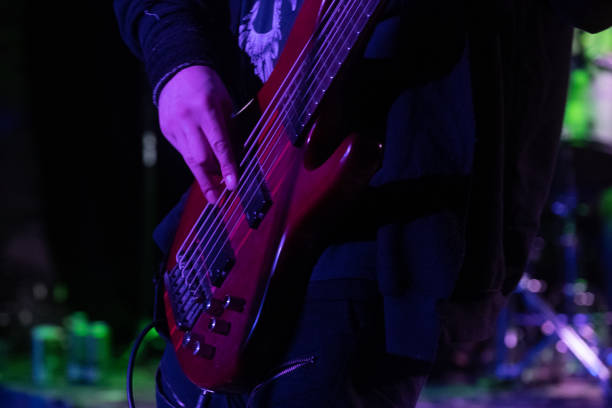 istock Rock Band in concert on stage 1465531756