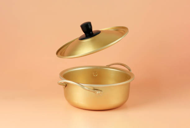 Brass Pot Korean Ramyeon Pan Soup with FLying Lid. Isolated stock photo