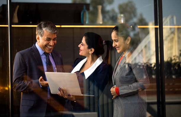 istock Business people with laptop at office 1465533374