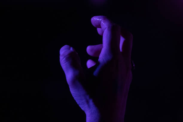istock Rock Band in concert on stage Fan in Crowd 1465534687