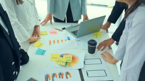 istock Business people proficiently discuss work project on meeting table . Corporate business team collaboration concept . 1465535267