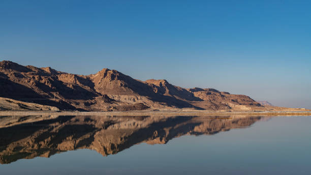 istock The beautiful Judean desert mountains reflected in the Dead Sea at Ein Bokek. 1465536737