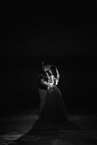 istock young couple having a picnic on the beach 1465541262