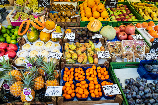 Vienna, Austria - October 14, 2022: Fruit and vegetable shop in Naschmarkt, street food market in Vienna, Austria