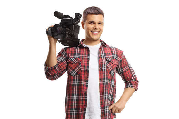 istock Man holding a professional recording camera on shoulder and smiling 1465543210