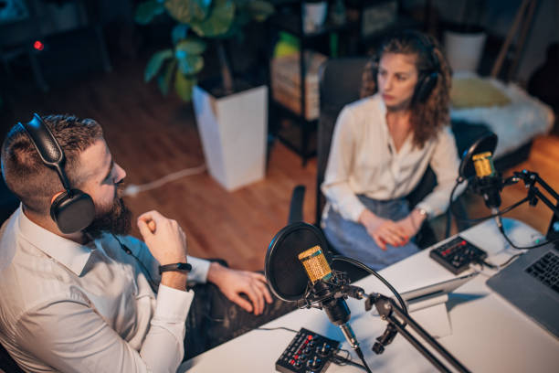 istock People in the podcast studio talking and recording 1465545826