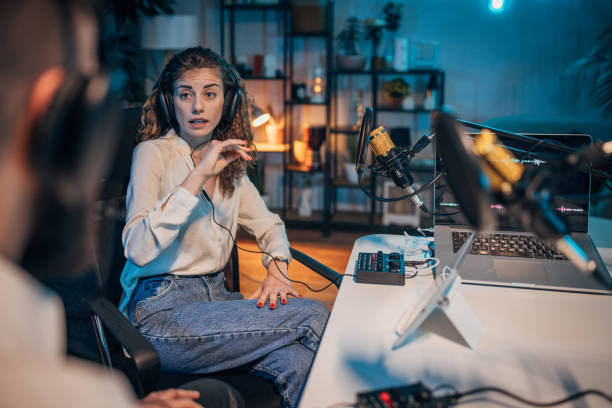 istock People in the podcast studio talking and recording 1465545878