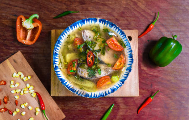 istock Vietnamese soup with fish and vegetables on wooden table 1465546083