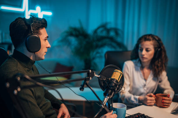 istock People in the podcast studio talking and recording 1465550573