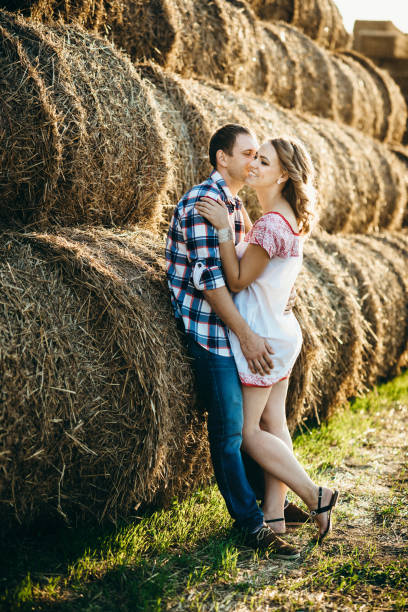 istock a guy with a girl on a summer walk in the field 1465554155
