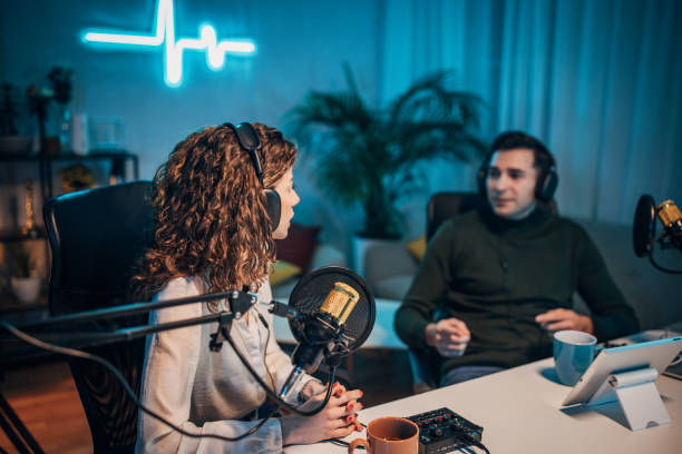 istock People in the podcast studio talking and recording 1465554242