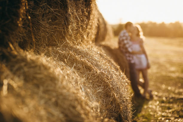 istock a guy with a girl on a summer walk in the field 1465555461