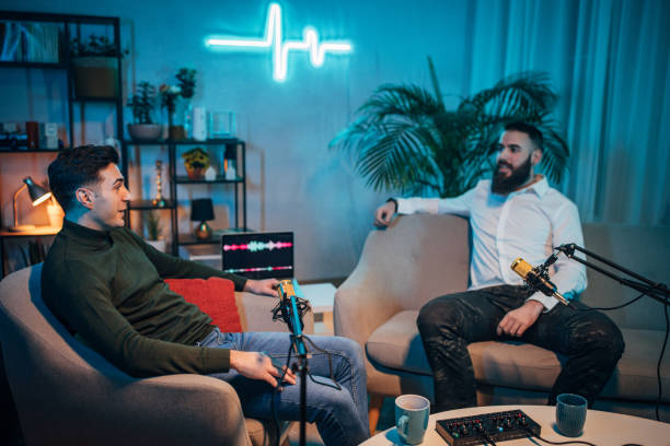 istock People in the podcast studio talking and recording 1465558157