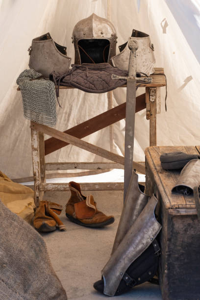 istock Medieval festival show, historical performance. Weapons, armor, utensils and objects of medieval life. 1465558408