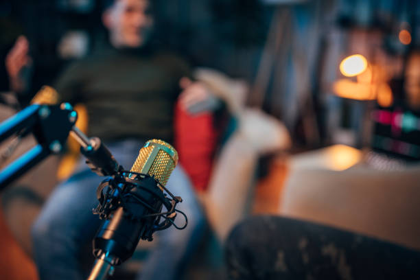 istock People in the podcast studio talking and recording 1465558541