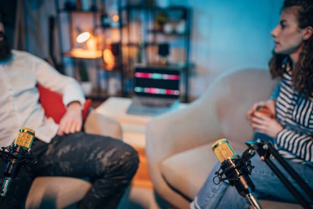 istock People in the podcast studio talking and recording 1465558840