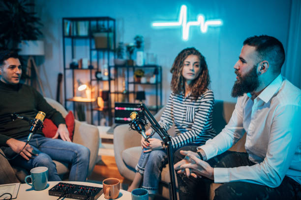 istock People in the podcast studio talking and recording 1465561662