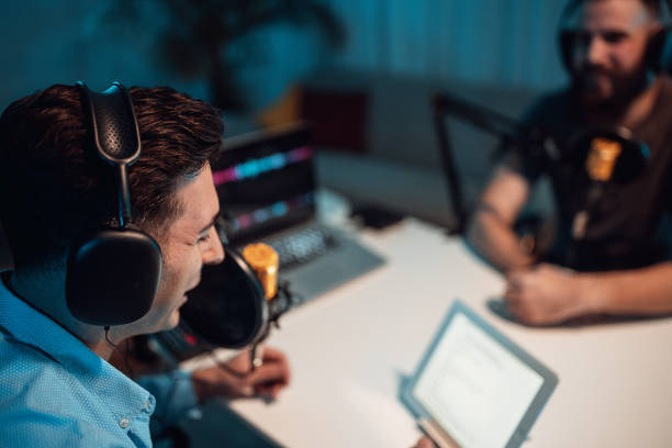 istock People in the podcast studio talking and recording 1465562508