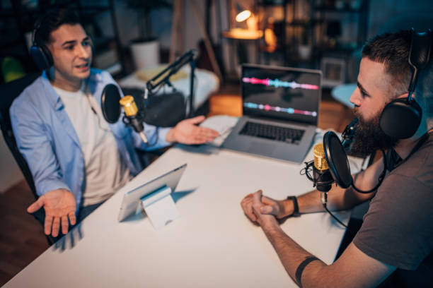 istock People in the podcast studio talking and recording 1465564560