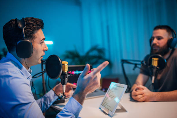 istock People in the podcast studio talking and recording 1465565046