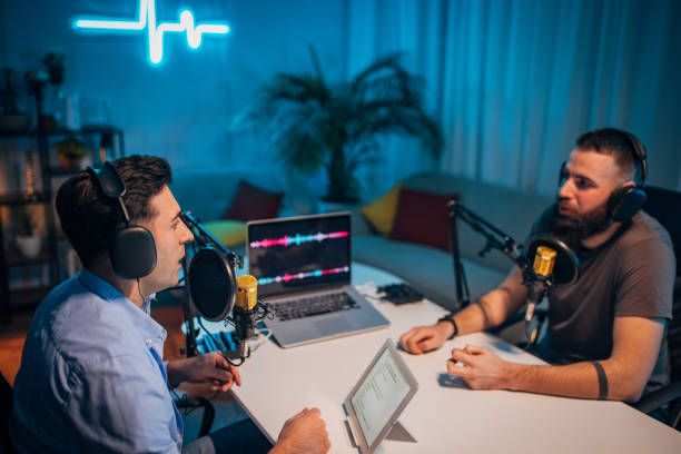 istock People in the podcast studio talking and recording 1465565176