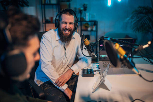 istock People in the podcast studio talking and recording 1465565883