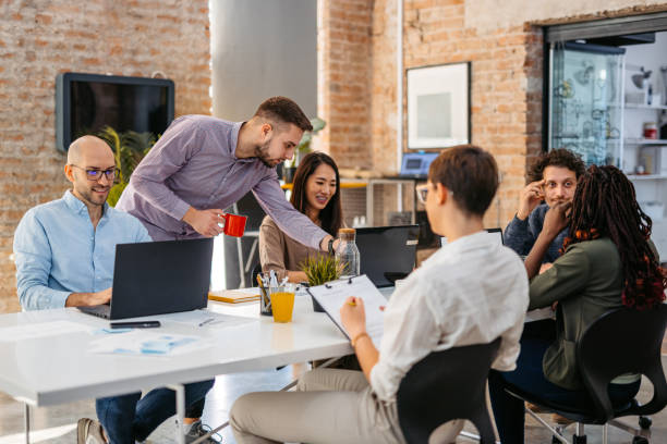 istock Colleagues Working Together In The Office 1465567221