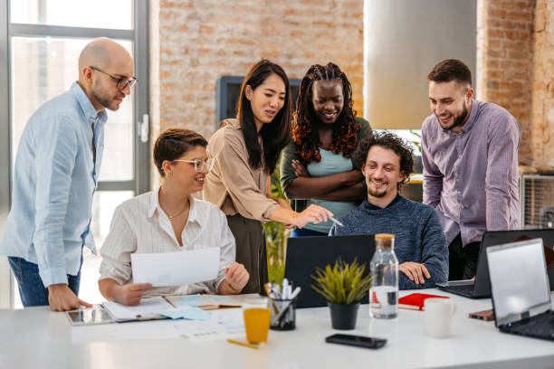 istock Colleagues Working Together In The Office 1465567255